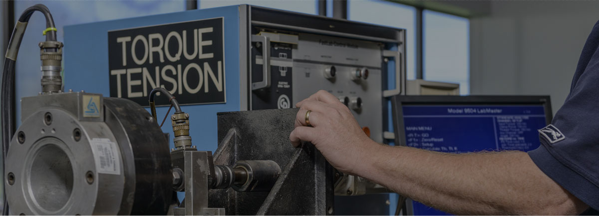 Depor employee conducting torque tension testing