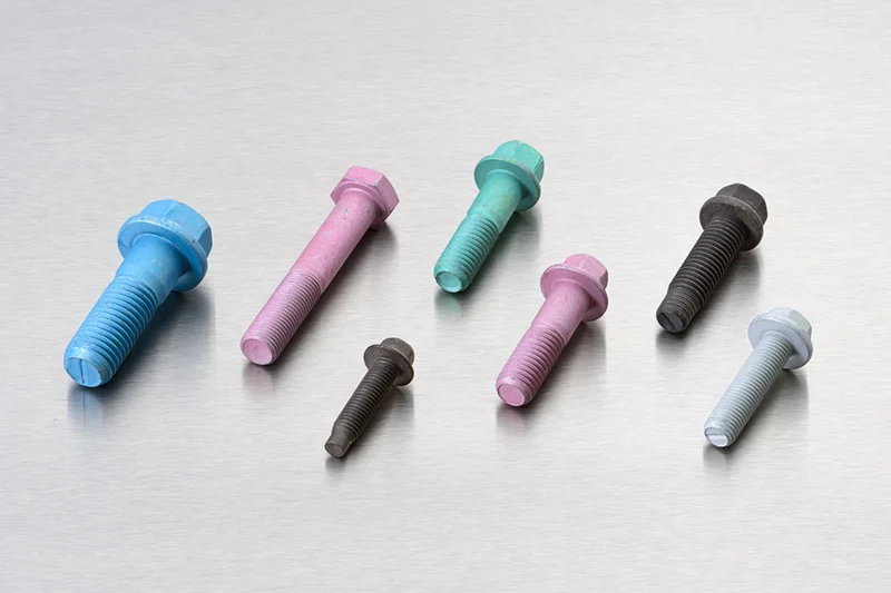 fasteners with color topcoats